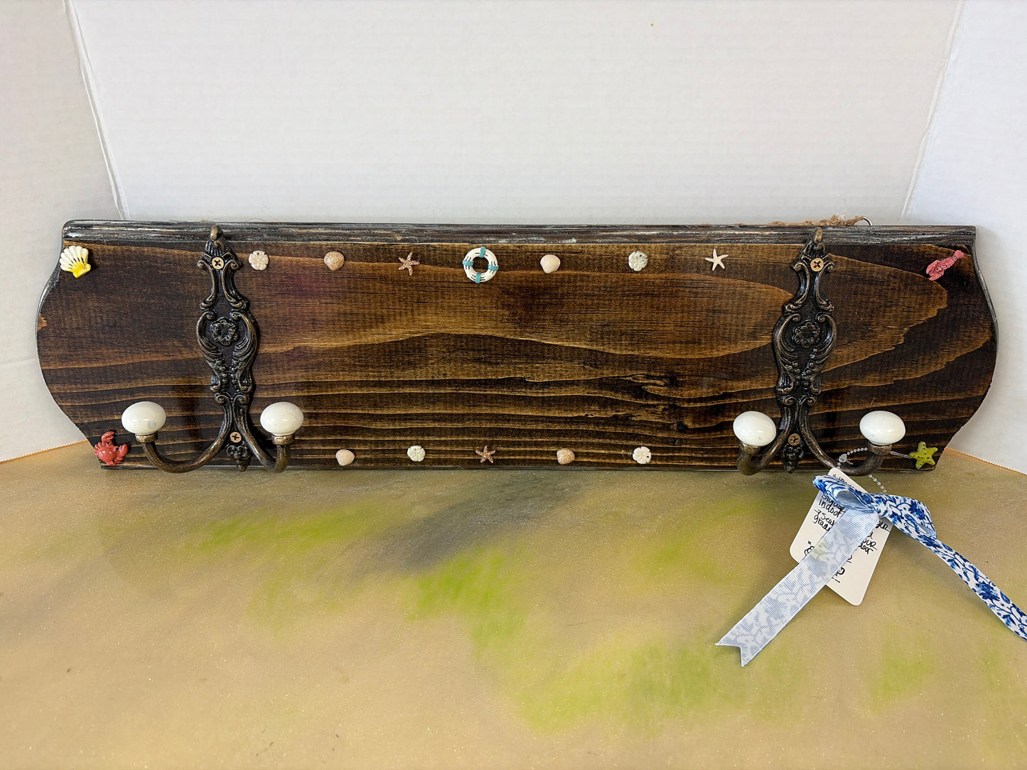 Pool towel hanger