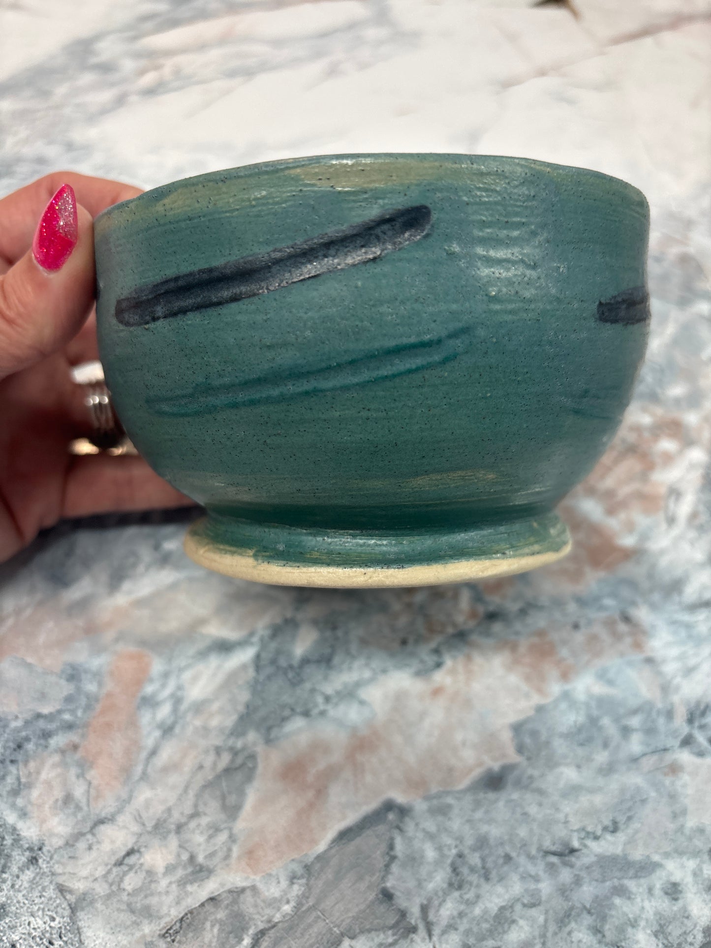 Teal and black bowl