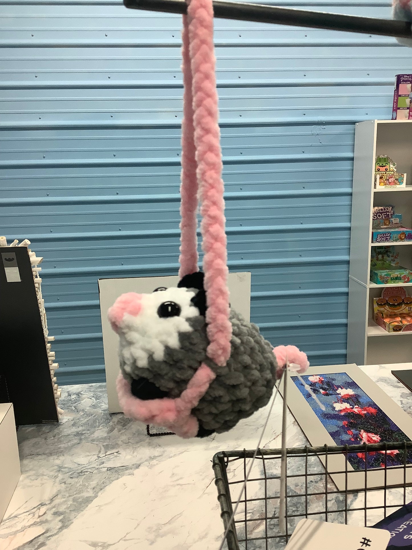 Hanging opossum