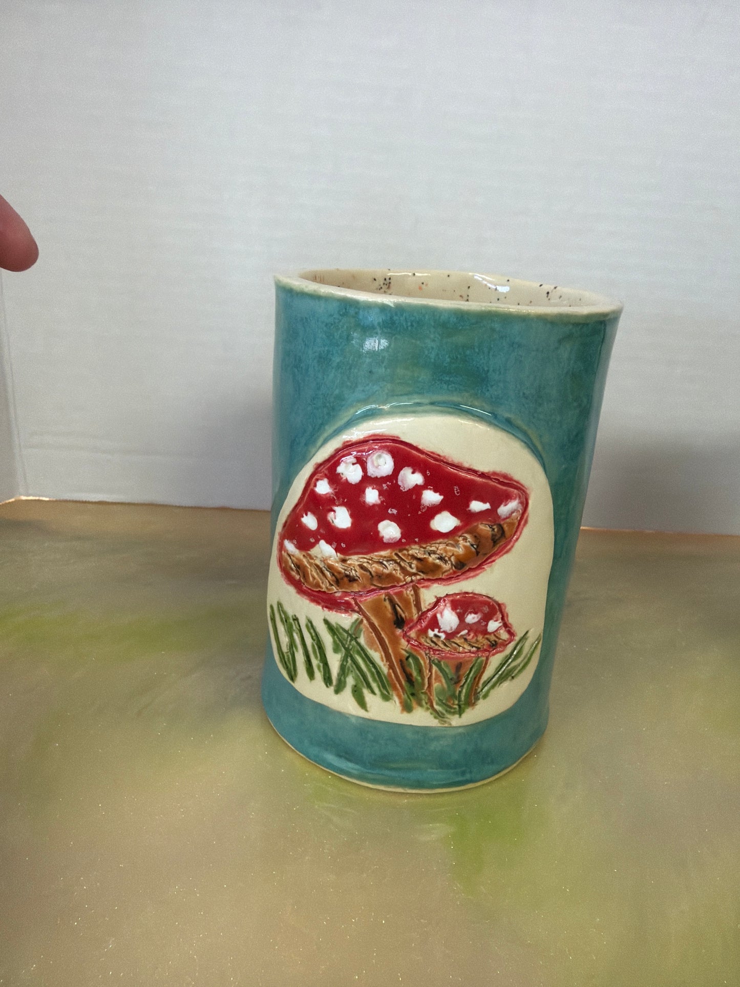 Handmade pottery mushroom coffee mug