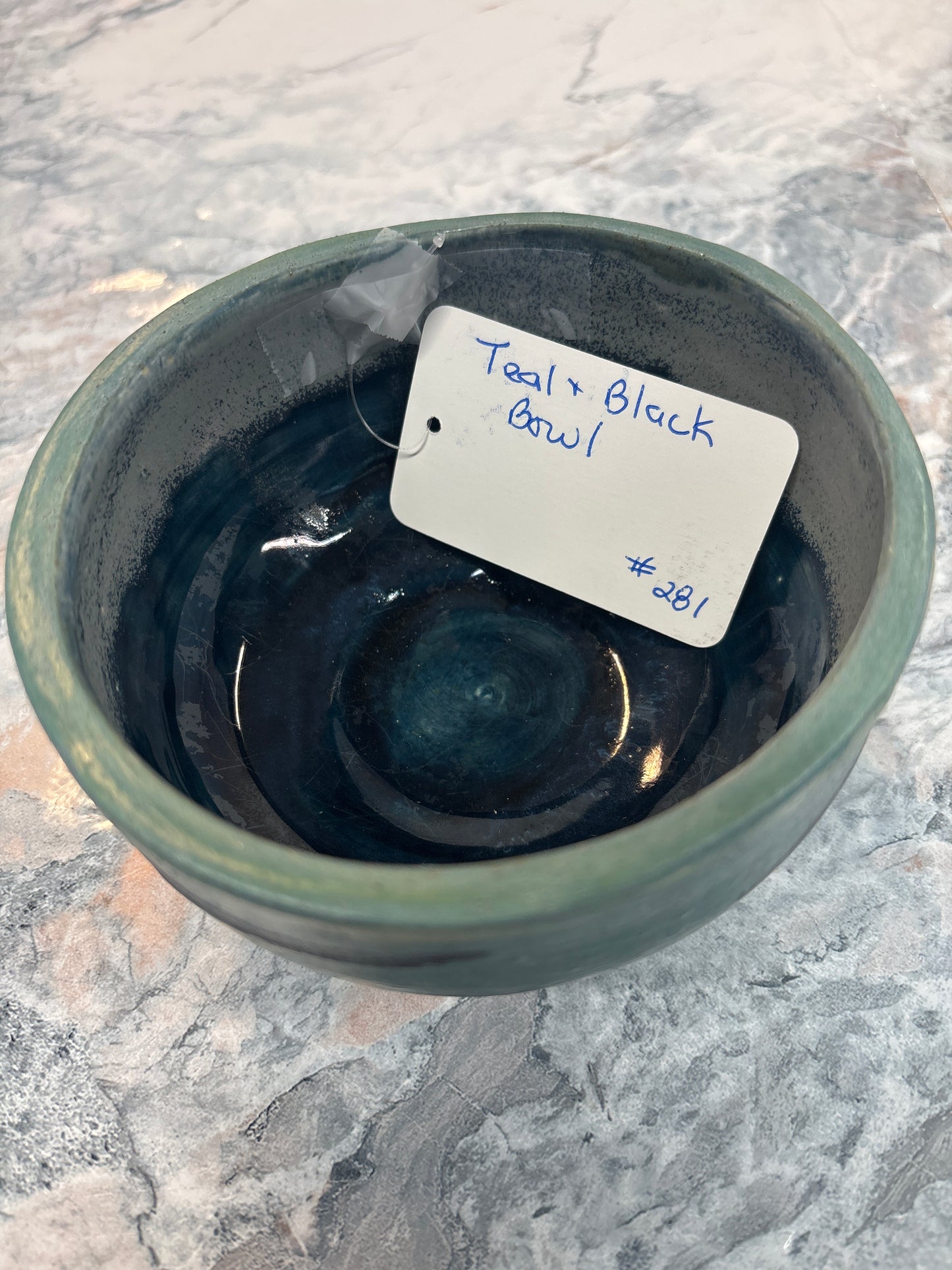 Teal and black bowl