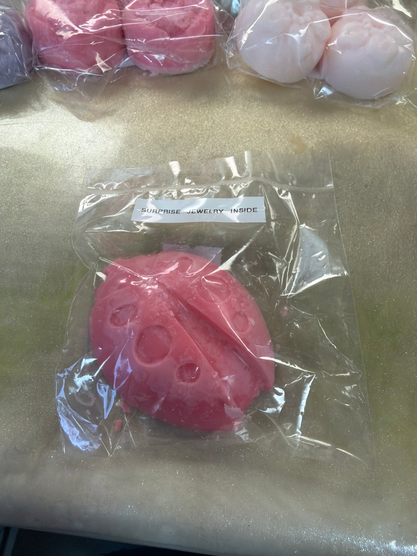 Soy wax melts with surprise jewelry inside